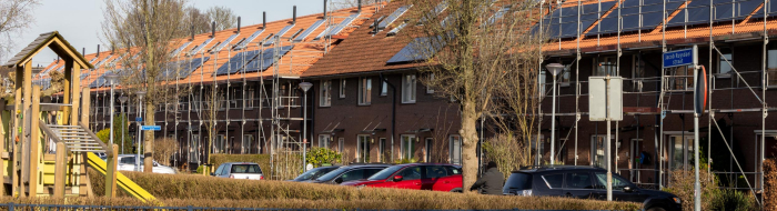 In een straat worden sommige woningen wel en sommige niet verduurzaamd